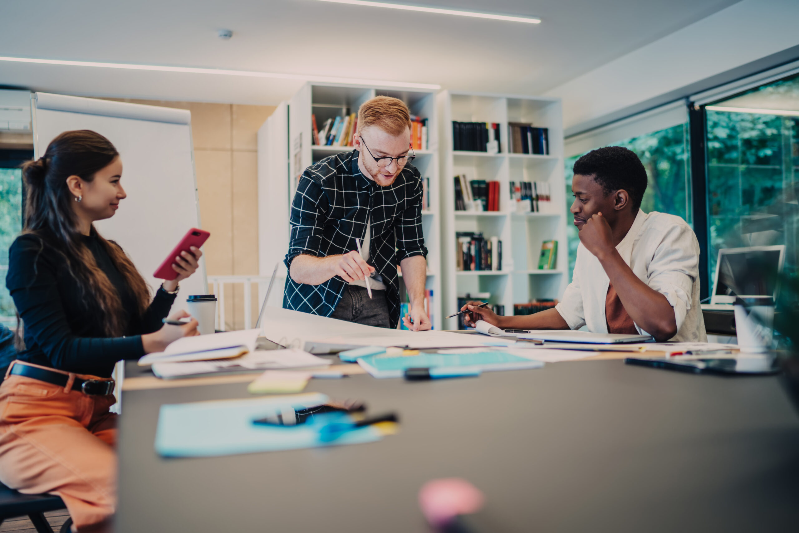 Active diverse colleagues communicating about project
